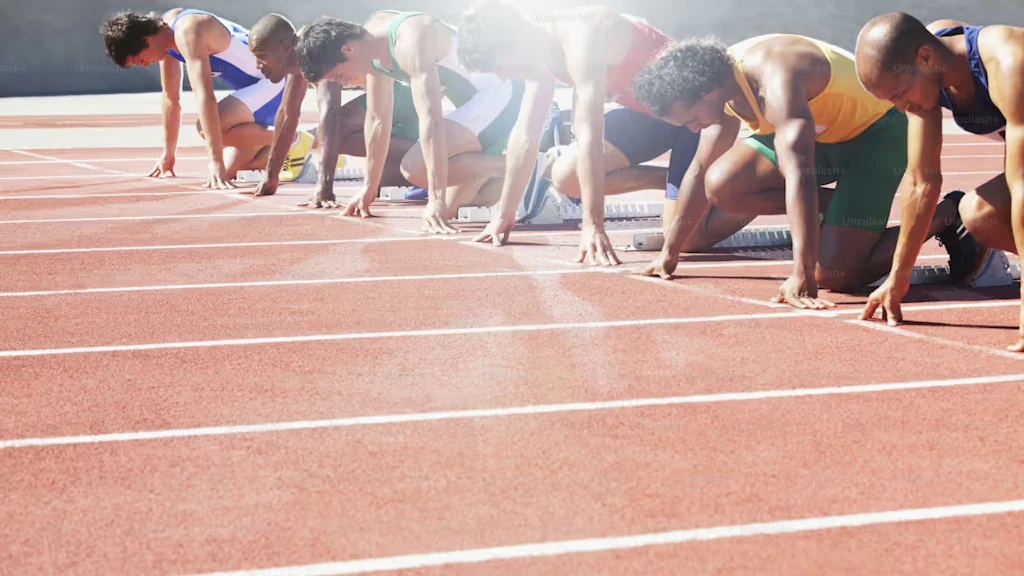 100-metre sprinters at the starting line.