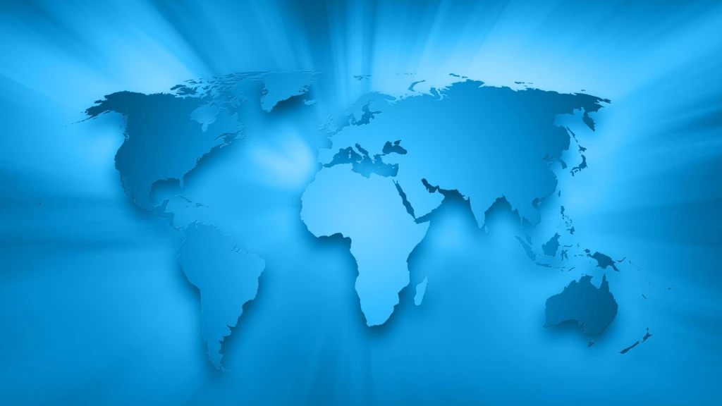A stylised blue map of the world, on which the continents are depicted as solid shapes and rays of light radiate outwards against a blue gradient background.