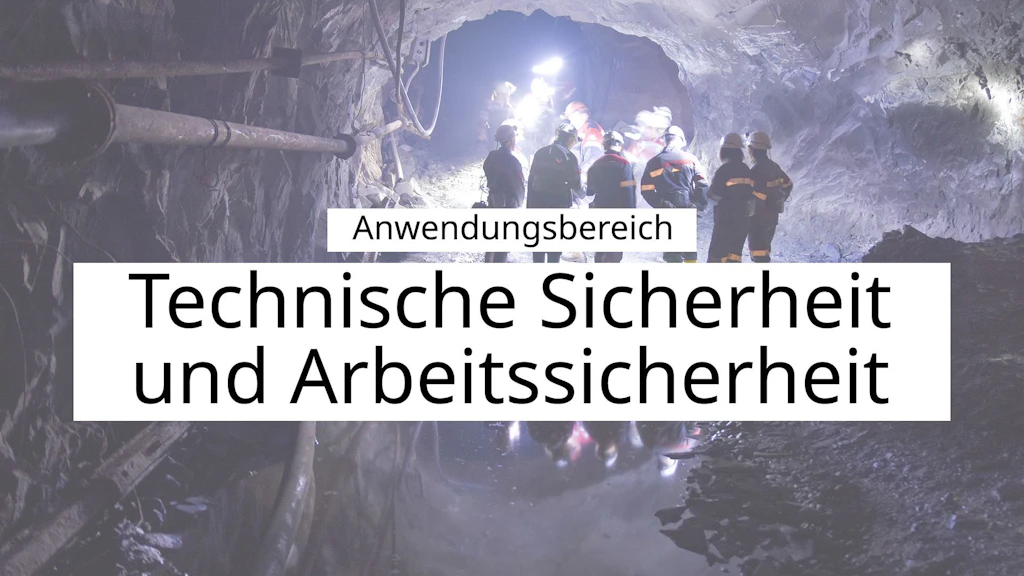 Team von Grubenarbeitern bei der Arbeit in einem Tunnel