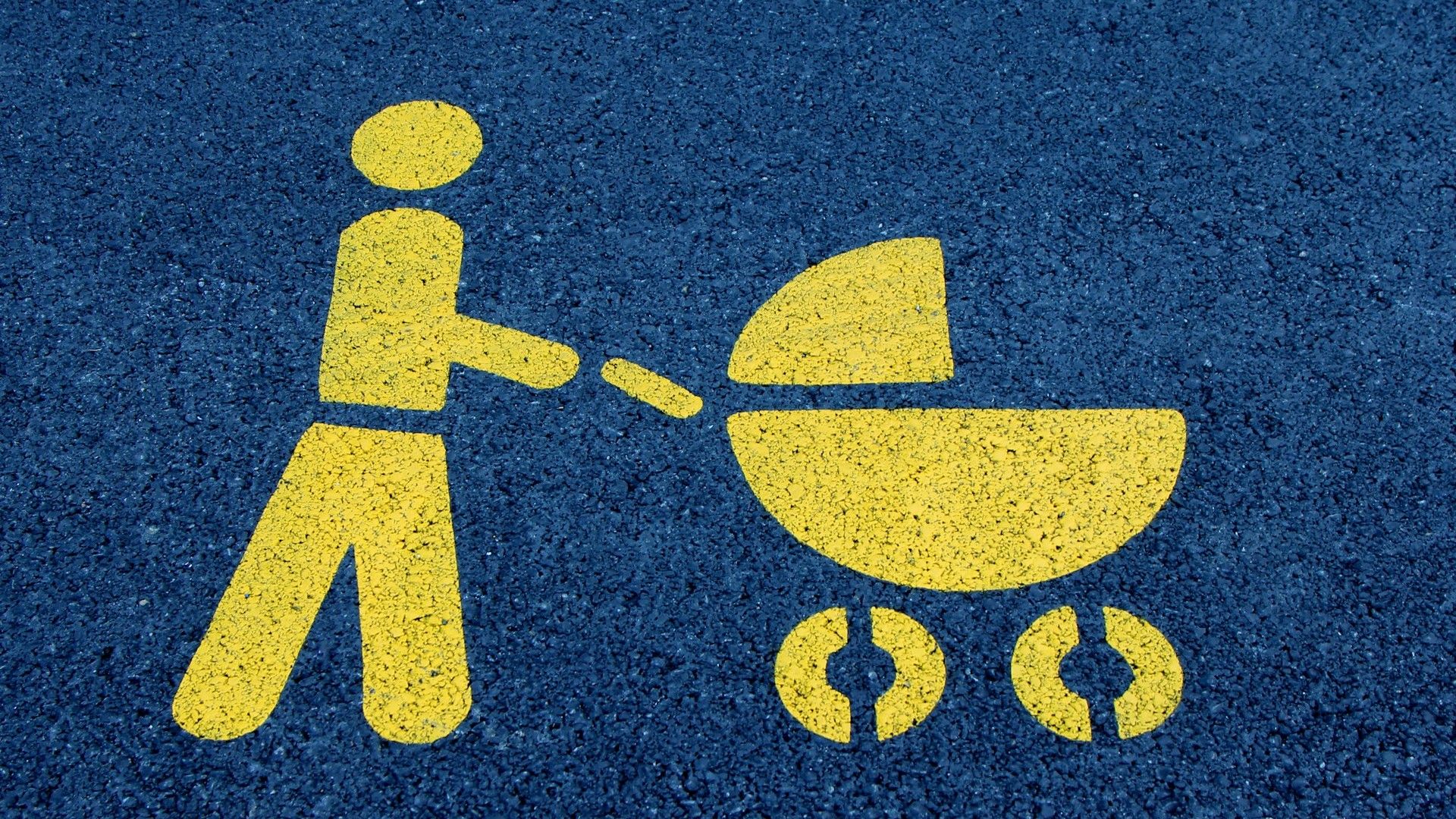 Gelbes Piktogramm einer Person, die einen Kinderwagen schiebt