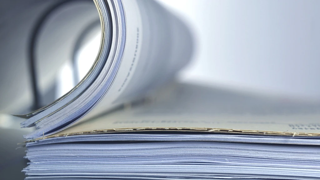 An open binder with files