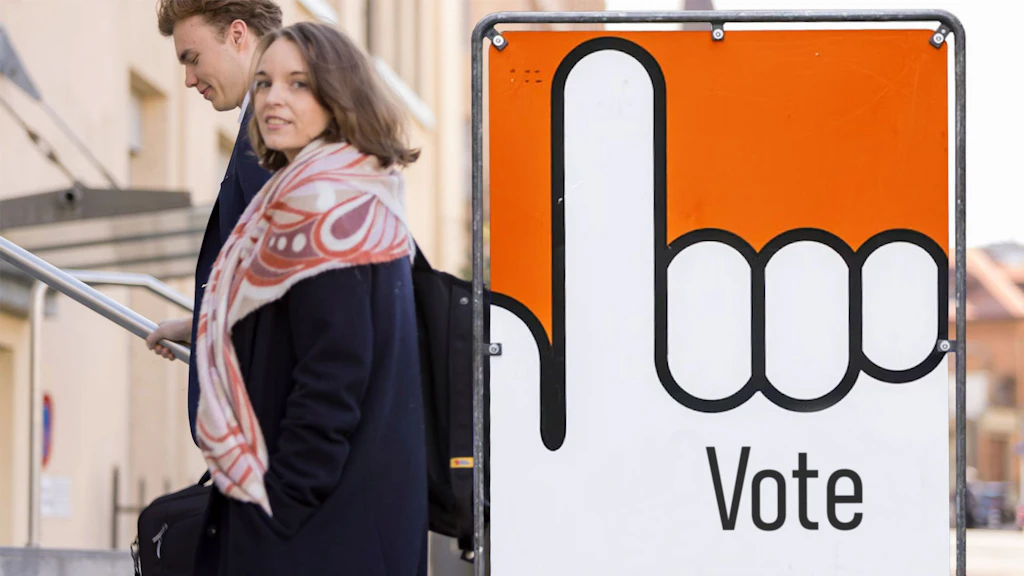 Two people are heading to the polls